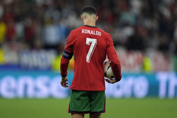 FILE - Portugal&#039;s Cristiano Ronaldo prepares to kick a penalty during a round of sixteen match between Portugal and Slovenia at the Euro 2024 soccer tournament in Frankfurt, Germany, Monday, July ...