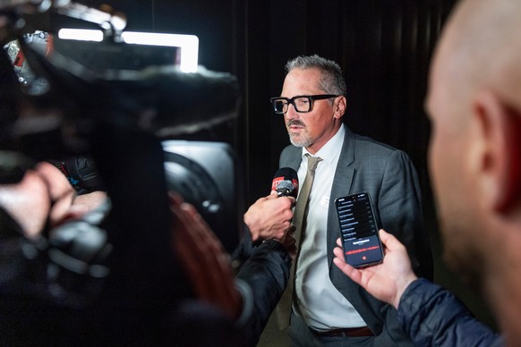 Christian Delaloye, the lawyer of Crans-Montana's Mayor, speaks to journalists ahead of the hearing after the public prosecutor of Valais, in Sion, Switzerland, Monday, April 13, 2026, following  ...
