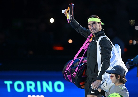 epa10307091 Rafael Nadal of Spain greets the audience as he leaves after losing against Felix Auger-Aliassime of Canada during a Singles round robin match of the ATP Finals 2022 at the Pala Alpitour i ...