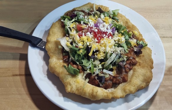 Navajo Fry Bread or Indian Taco or Navajo Pizza, traditional Navajo dish made with simple ingredients.
