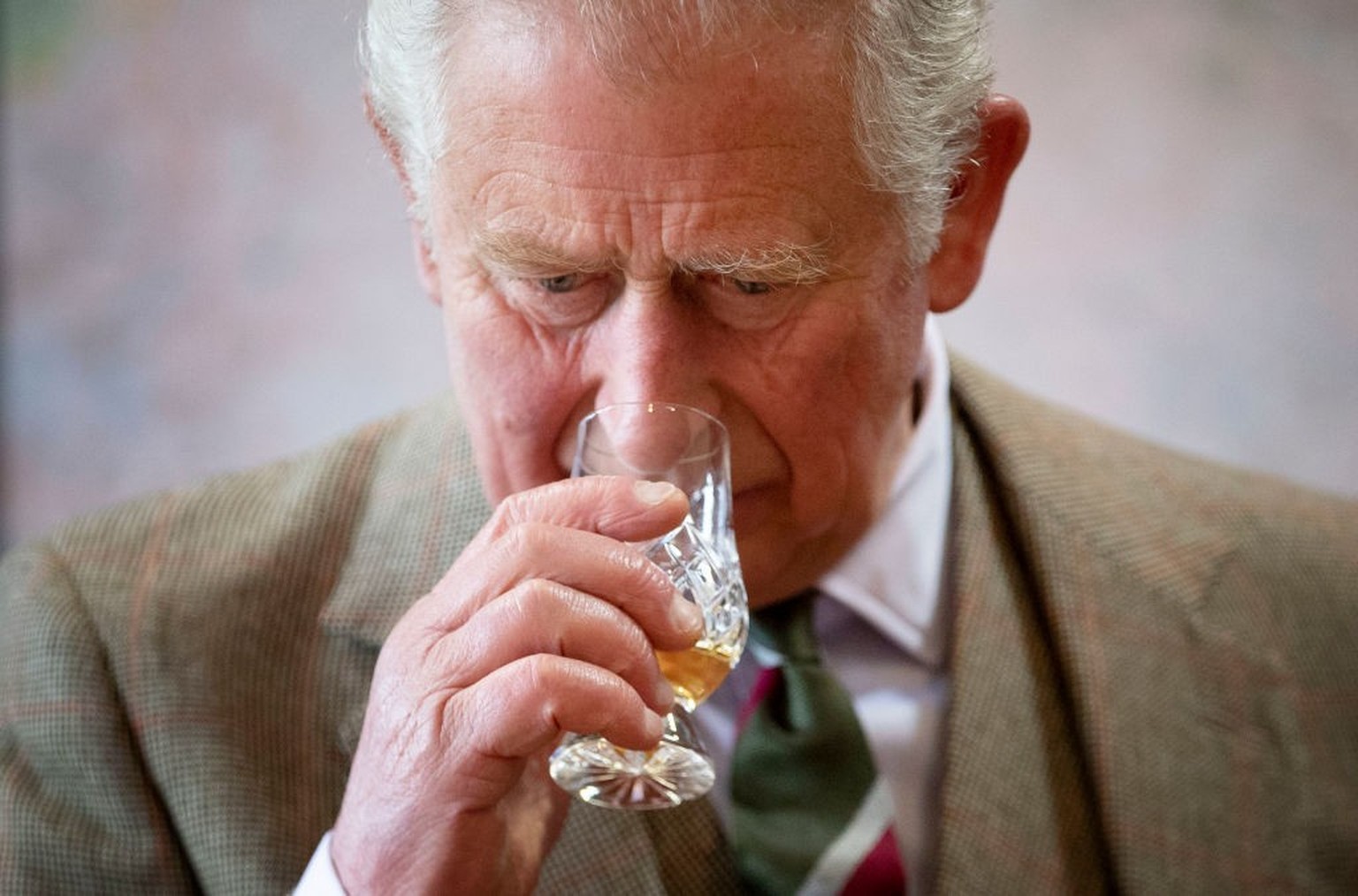 The Prince of Wales, known as the Duke of Rothesay while in Scotland, takes part in a whisky tasting during a visit to the Royal Lochnagar Distillery at Crathie on Royal Deeside. (Photo by Jane Barlow ...