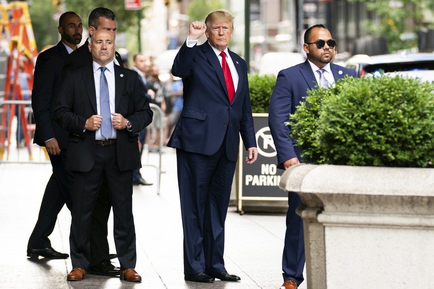 Former President Donald Trump gestures as he departs Trump Tower, Wednesday, Aug. 10, 2022, in New York, on his way to the New York attorney general&#039;s office for a deposition in a civil investiga ...