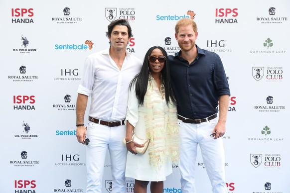 SINGAPORE, SINGAPORE - AUGUST 12: Dr Sophie Chandauka MBE, Chair of Sentebale, Nacho Figueras, Sentebale Ambassador and Prince Harry, Duke of Sussex, Co-Founding Patron of Sentebale, pose for a photo  ...