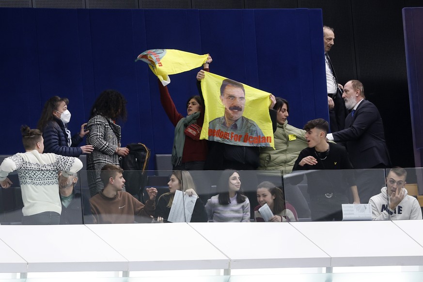 Kurdish activists followers of jailed PKK leader Abdullah Ocalan demonstrate during a session, Wednesday, Feb. 15, 2023 at the European Parliament in Strasbourg, eastern France. (AP Photo/Jean-Francoi ...