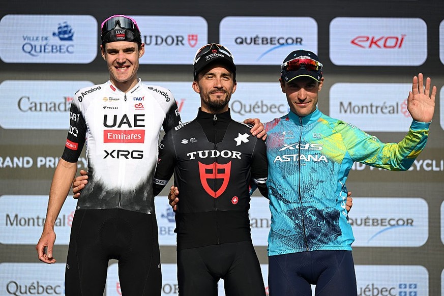 QUEBEC CITY, QUEBEC - SEPTEMBER 12: (L-R) Pavel Sivakov of France and UAE Team Emirates - XRG on second place, race winner Julian Alaphilippe of France and Team Tudor Pro Cycling and Alberto Bettiol o ...