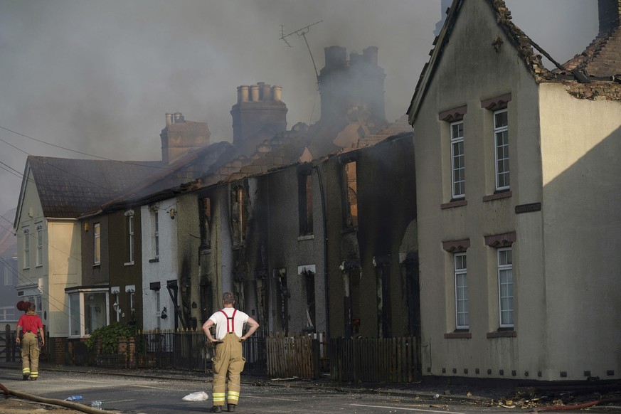 The scene of a blaze in the village of Wennington, east London, Tuesday, July 19, 2022. The typically temperate nation of England is the latest to be walloped by unusually hot, dry weather that has tr ...