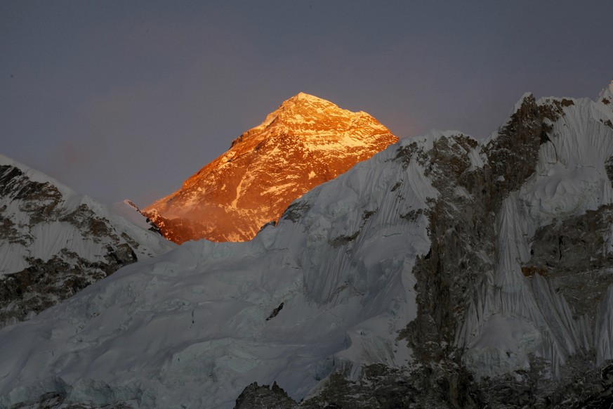 CAPTION ADDITION: FILE - In this Nov. 12, 2015, file photo, Mt. Everest is seen from the way to Kalapatthar in Nepal. China will draw a �??separation line�?� atop Mount Everest to prevent the coronavi ...