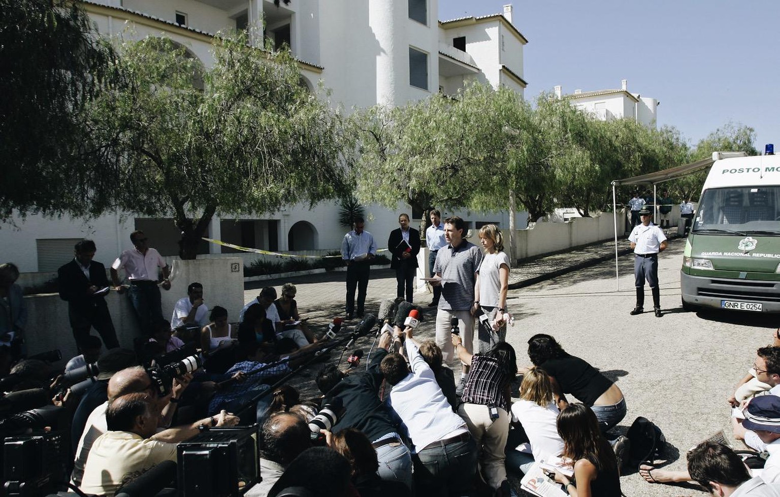 Gerry and Kate McCann, the parents of the missing 3-year-old girl Madeleine McCann, read a statement to the press outside their resort apartment Friday, May 11 2007, in Praia da Luz, southern Portugal ...