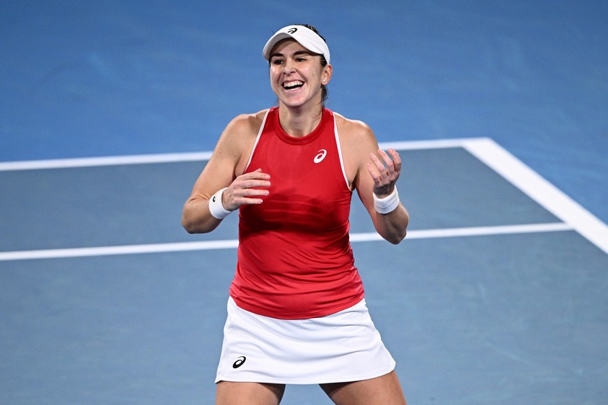 epa12642029 Belinda Bencic of Switzerland celebrates after winning her singles match against Iga Swiatek of Poland during the 2026 United Cup final between Poland and Switzerland at Ken Rosewall Arena ...