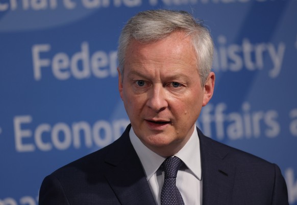 epa09862006 French Minister of Economy and Finance Bruno Le Maire and German Economy and Climate Protection Minister (not pictured) speak to the media following talks at the Federal Ministry for Econo ...