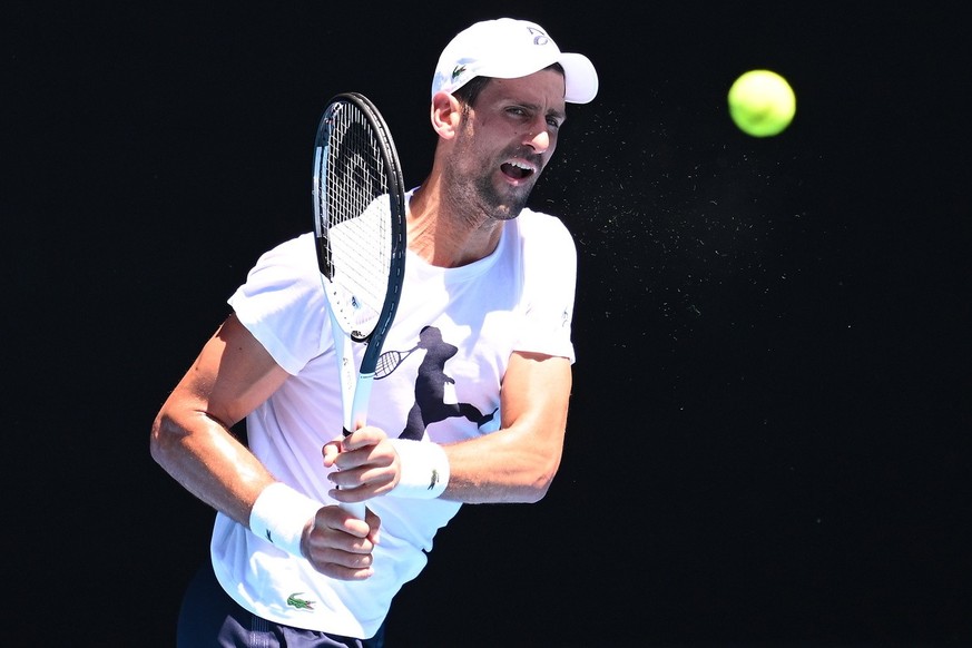 epa10399349 Novak Djokovic of Serbia during an Australian Open practice session at Melbourne Park in Melbourne, Australia, 11 January 2023. EPA/JAMES ROSS AUSTRALIA AND NEW ZEALAND OUT