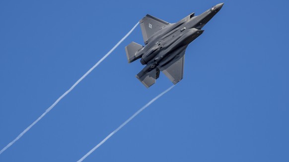 A U.S. F-35 fighter jet flies over the Eifel Mountains near Spangdahlem, Germany, Wednesday, Feb. 23, 2022. The U.S. Armed Forces moved stealth fighter jets to Spangdahlem Air Base a few days ago. The ...