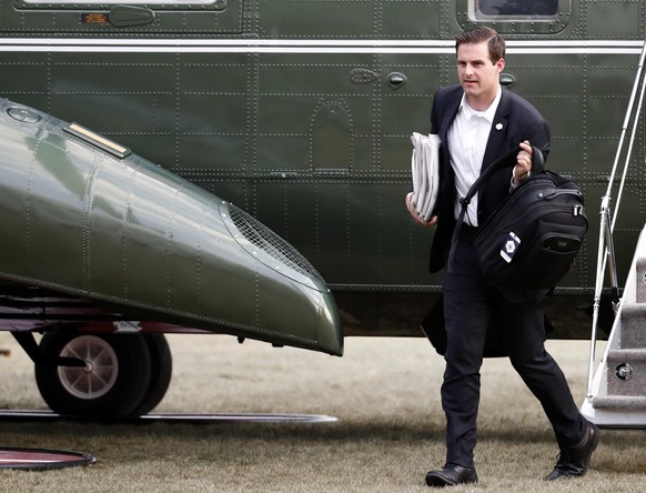 White House aide John McEntee steps off Marine One at the White House, Sunday, March 19, 2017, in Washington. President Donald Trump, who is returning from a trip to his Mar-a-Lago estate in Palm Beac ...
