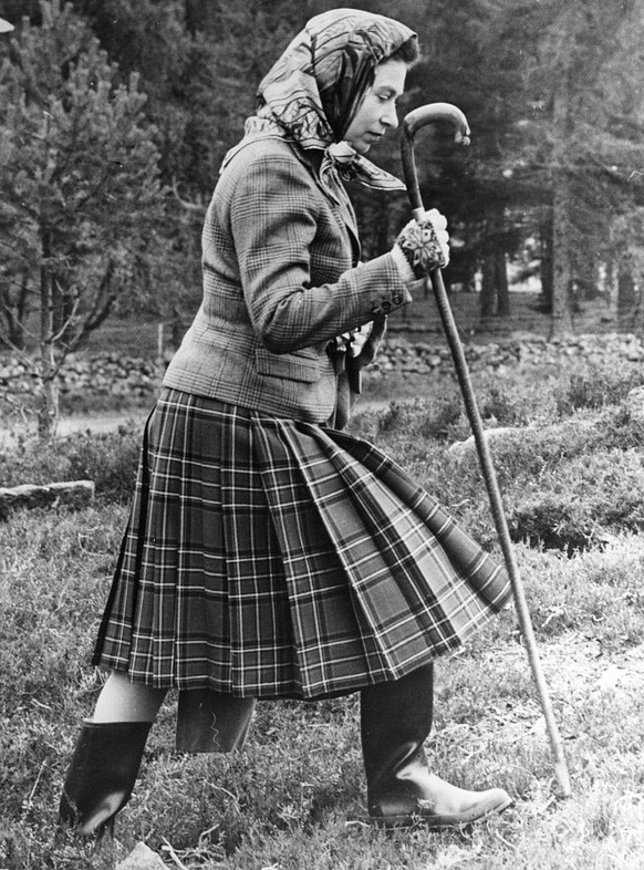 6th October 1967: Queen Elizabeth II walking cross country at the North of Scotland Gun Dog Association Open Stake Retreiver Trials in the grounds of Balmoral Castle. (Photo by Central Press/Getty Ima ...