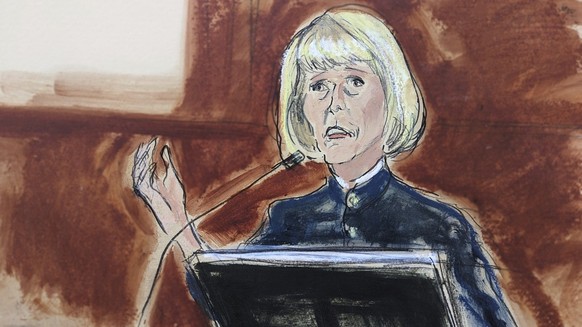 E. Jean Carroll testifies on the witness stand in federal court in New York on Monday, May 1, 2023. Carroll, who says Donald Trump raped her in a department store&#039;s dressing room two decades befo ...