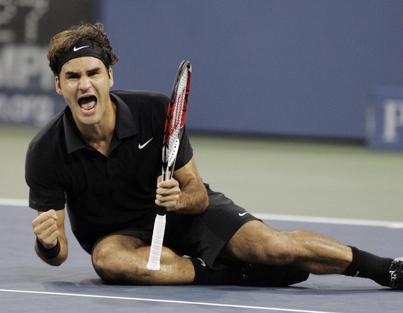 Roger Federer of Switzerland celebrates after winning the men's finals against Novak Djokovic of Serbia at the US Open tennis tournament in New York, Sunday, Sept. 9, 2007. (AP Photo/Kathy Willen ...