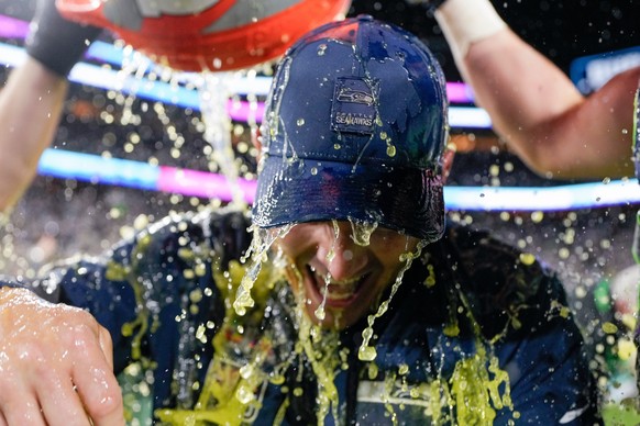 Seattle Seahawks head coach Mike MacDonald is doused after defeating the New England Patriots Bowl 60 football game, Sunday, Feb. 8, 2026, in Santa Clara, Calif. (AP Photo/Brynn Anderson)
Mike MacDona ...