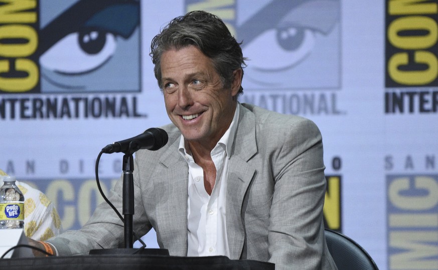 Hugh Grant speaks during a panel for &quot;Dungeons and Dragons: Honor Among Thieves&quot; on day one of Comic-Con International on Thursday, July 21, 2022, in San Diego. (Richard Shotwell/Invision/AP ...