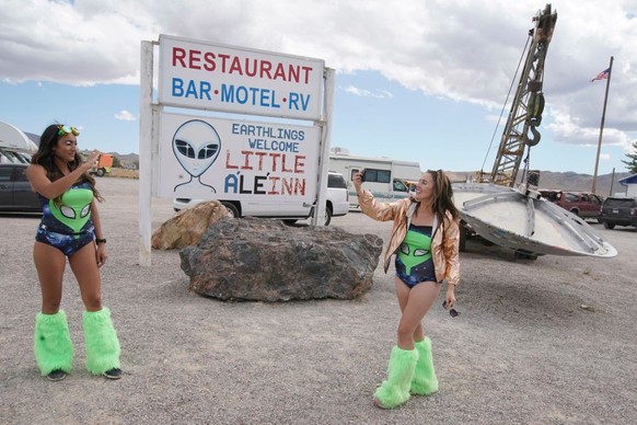 RACHEL, NV - SEPTEMBER, 19: Two girls do a live stream for Hay Frase pod cast out of Washington, D.C. at the Storm Area 51 event this coming weekend, on September 19, 2019 in Rachel, Nevada. The socia ...