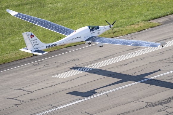SolarStratos, a solar powered aircraft prototype, flown by Swiss adventurer Raphael Domjan during takeoff at Payerne Airport, Switzerland, Tuesday, June 24, 2025. (KEYSTONE/Til Buergy)