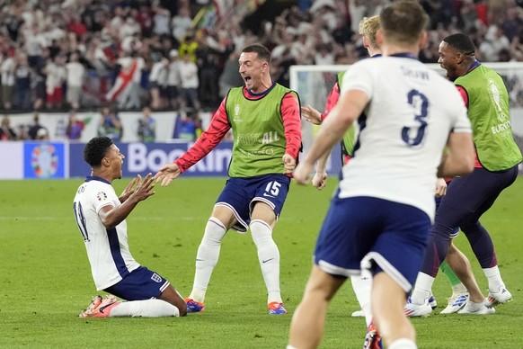 England&#039;s Ollie Watkins, left, celebrates after scoring his side&#039;s second goal during a semifinal match between the Netherlands and England at the Euro 2024 soccer tournament in Dortmund, Ge ...