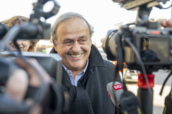 epa11938231 Former UEFA president Michel Platini (C) leaves the special appeals court in Muttenz, Switzerland, on 03 March 2025. A special appeals court, sitting in Muttenz near Basel, will hear a req ...