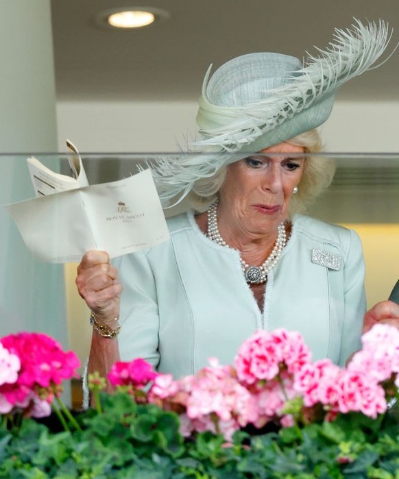 ASCOT, UNITED KINGDOM - JUNE 24: (EMBARGOED FOR PUBLICATION IN UK NEWSPAPERS UNTIL 24 HOURS AFTER CREATE DATE AND TIME) Queen Camilla, King Charles III and Lady Gabriella Windsor watch, from the Royal ...