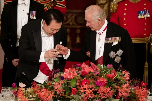 South Korean President state visit to the UK President of South Korea Yoon Suk Yeol listens as King Charles III speaks at the state banquet at Buckingham Palace, London, for the state visit to the UK ...