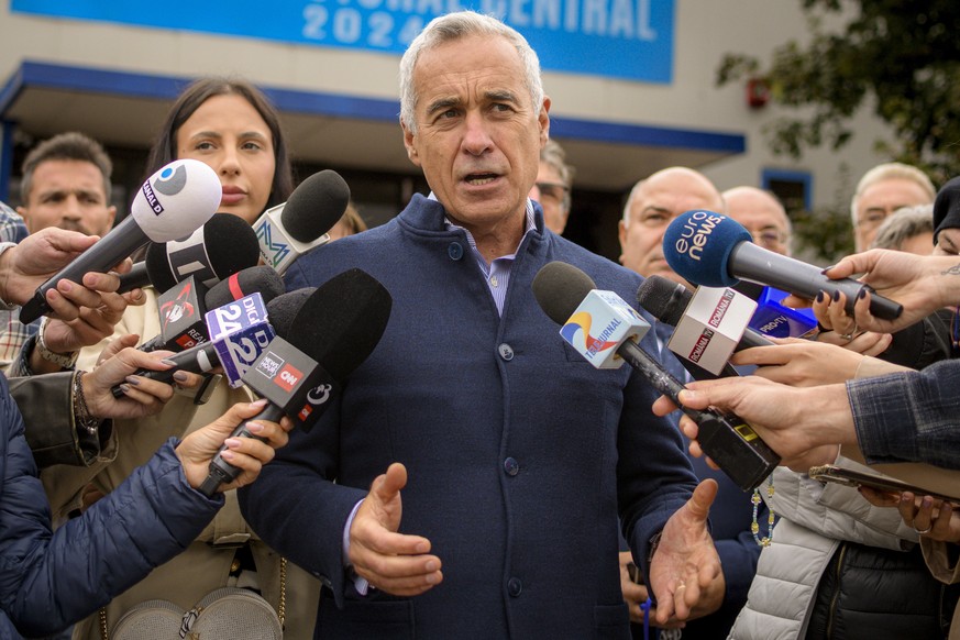 Calin Georgescu, running as an independent candidate for president, speaks to media after registering his bid in the country&#039;s presidential elections, in Bucharest, Romania, Tuesday, Oct. 1, 2024 ...