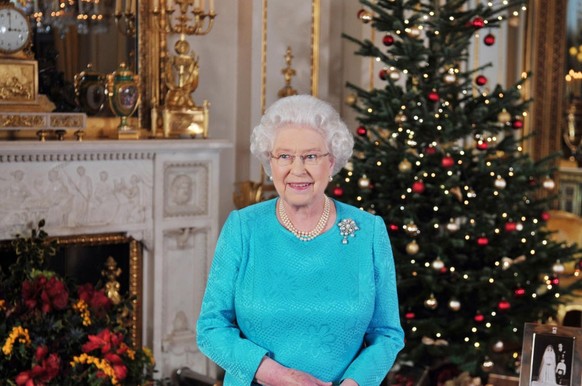 Britain&#039;s Queen Elizabeth II prior to the recording of her Christmas Day broadcast to the Commonwealth, in the White Drawing Room at Buckingham Palace. (Photo by John Stillwell/PA Images via Gett ...