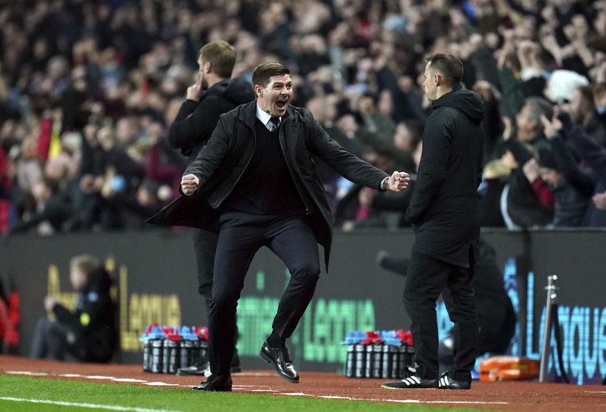 Aston Villa manager Steven Gerrard celebrates the opening goal during the Premier League match at Villa Park, Birmingham, Britain, Saturday Nov. 20, 2021. (Nick Potts/PA via AP)