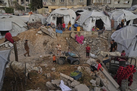 Displaced Palestinians live in a tent camp in Gaza City, Monday, June 23, 2025. (AP Photo/Jehad Alshrafi)
Israel Palestinians