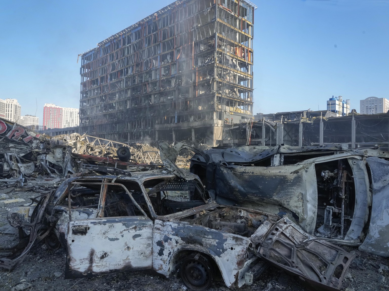 A view of the damage after the Russian shelling of a shopping center, in Kyiv, Ukraine, Monday, March 21, 2022. Eight people were reported to be killed in the attack. (AP Photo/ (AP Photo/Efrem Lukats ...