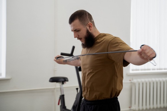 A former soldier trains at Trinity Hub, a rehabilitation centre for the visually impaired in Kyiv on February 7, 2025, amid the Russian invasion of Ukraine. Many of those returning blind from the fron ...