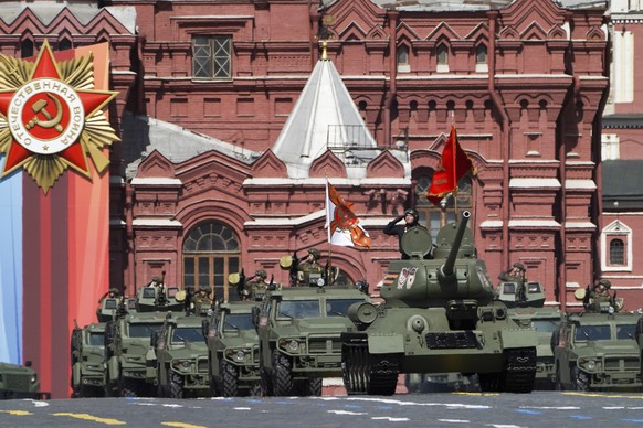 The legendary Soviet tank E-34 leads the column of Russian armored vehicles in Red Square during the Victory Day military parade in Moscow, Russia, Tuesday, May 9, 2023, marking the 78th anniversary o ...