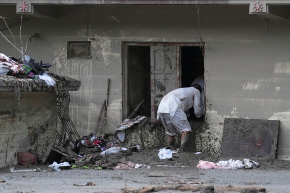 A resident searches for belongings in his damaged house after flash flooding in the Devighat area of Nuwakot district, Nepal, Saturday, Aug. 29, 2026. (AP Photo/Rajesh Kumar Singh)
Nepal Flash Floods