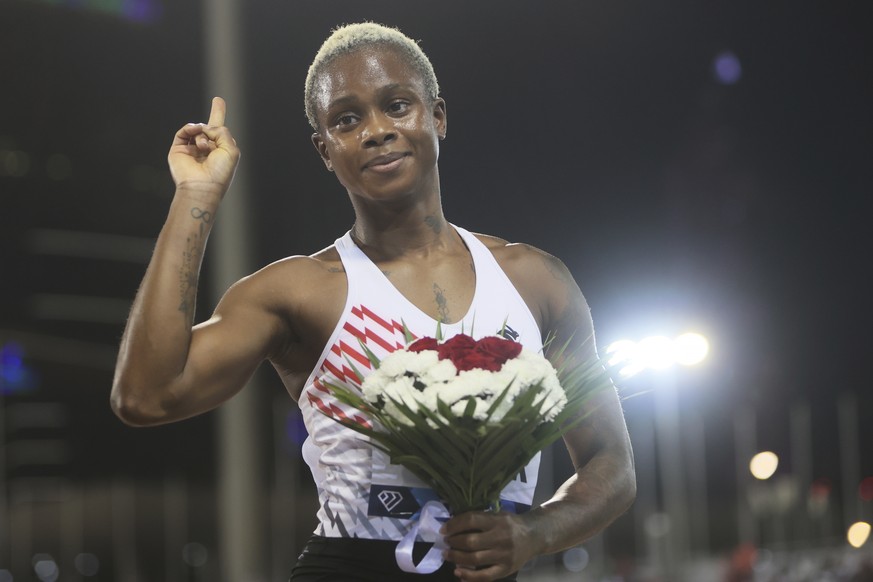 Bahrain&#039;s Salwa Eid Naser celebrates after winning the women&#039;s 400 meters event at the women&#039;s triple jump event at the Diamond League athletics meet at the Qatar Sports Club stadium in ...
