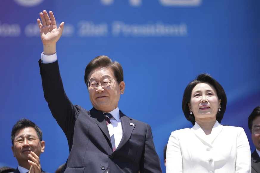 South Korean new President Lee Jae-myung and his wife Kim Hea Kyung leave after attending the presidential inauguration at the National Assembly in Seoul, South Korea, Wednesday, June 4, 2025. (AP Pho ...