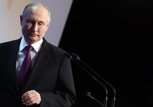 epa10888466 Russian President Vladimir Putin attends a concert dedicated to the 100th birth anniversary of Soviet and Russian poet Rasul Gamzatov at the State Kremlin Palace in Moscow, Russia, 28 Sept ...