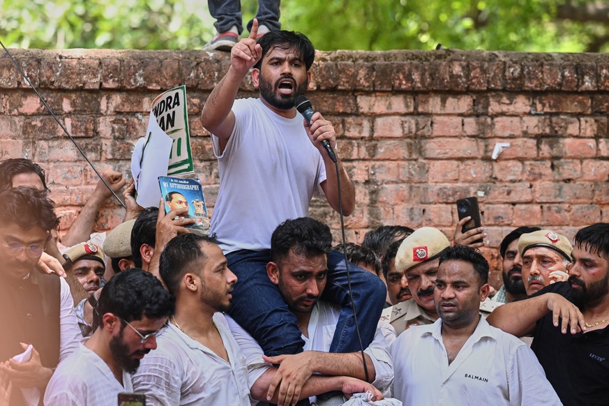 Abhijeet Dipke, center, founder of the Cockroach Janta Party addresses his supporters during a protest rally in New Delhi, India, Saturday, June 6, 2026. (AP Photo)
Abhijeet Dipke