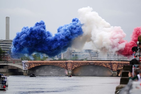Smoke resembling the flag of France on the Pont d&#039;Austerlitz during the opening ceremony of the Paris 2024 Olympic Games in France. Picture date: Friday July 26, 2024. (Photo by John Walton/PA Im ...
