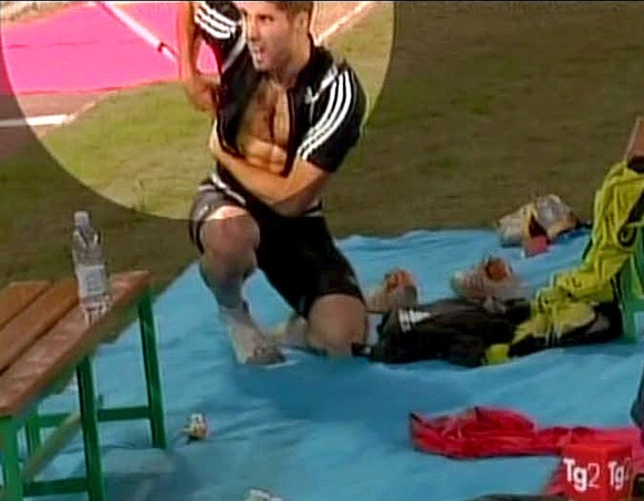 epa01066087 A frame taken from telejournal Tg2 of Italian public broadcaster RAI showing French long jumper, Salim Sdiri, soon after he was hit by a javelin thrown by Finnish athlete Tero Pitkamaeki a ...