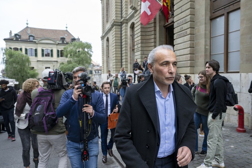 Famous Swiss Islamic scholar Tariq Ramadan leaves after reading of the verdict at the Geneva courthouse with the Geneva prosecutor as part of a sexual assault investigation, in Geneva, Switzerland, We ...