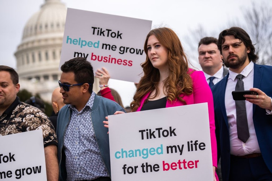 UNITED STATES - MARCH 13: TikTok supporters are seen outside the U.S. Capitol before the House passed the Protecting Americans from Foreign Adversary Controlled Applications Act, that could ban TikTok ...
