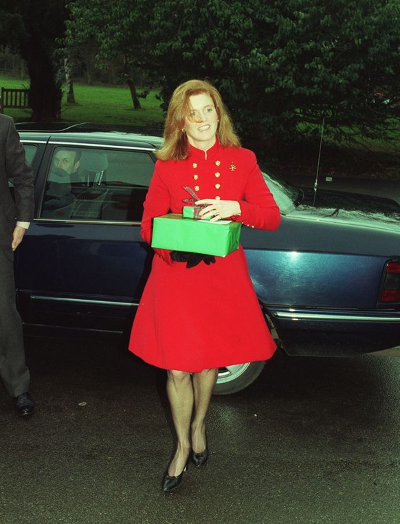 The Duchess of York arrives bearing gifts at the Coulsdon golf club where she attended a Christmas party for sufferers of Motor Neuron disease. the duchess, patron of MNDA, handed out presents which s ...