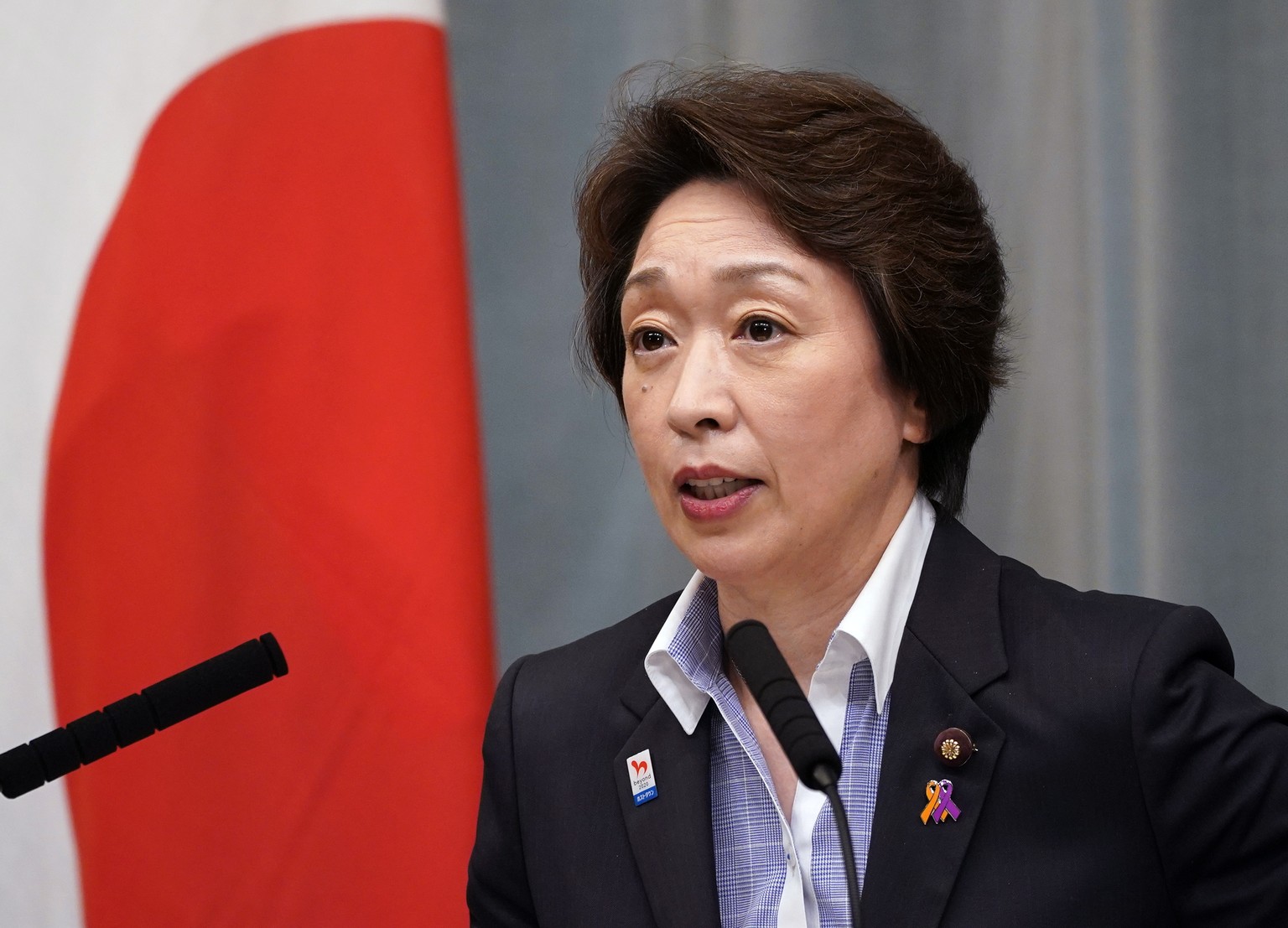 epa09020473 (FILE) - A file photo dated 17 September 2020 shows Japan&#039;s then Minister for the Tokyo Olympic and Paralympic Games Seiko Hashimoto speaking during a news conference at the Prime Min ...