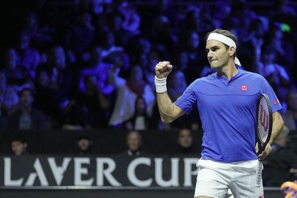 Team Europe&#039;s Roger Federer playing with Rafael Nadal reacts after winning a point during their Laver Cup doubles match against Team World&#039;s Jack Sock and Frances Tiafoe at the O2 arena in L ...