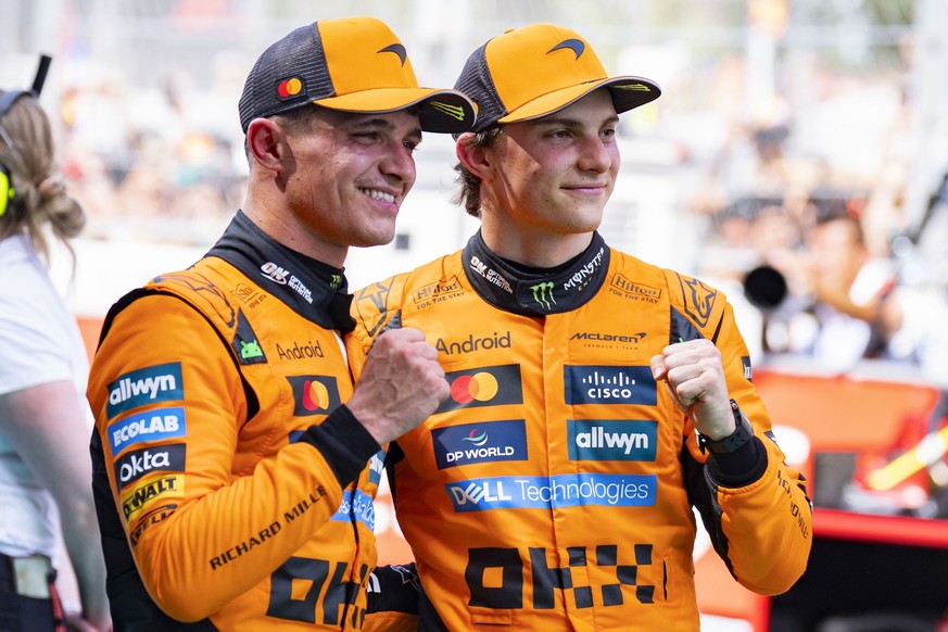 KEYPIX - epa12149423 First placed McLaren driver Oscar Piastri (R) of Australia and second placed teammate Lando Norris of Britain (L) pose after the Formula 1 Grand Prix of Spain at Circuit de Barcel ...