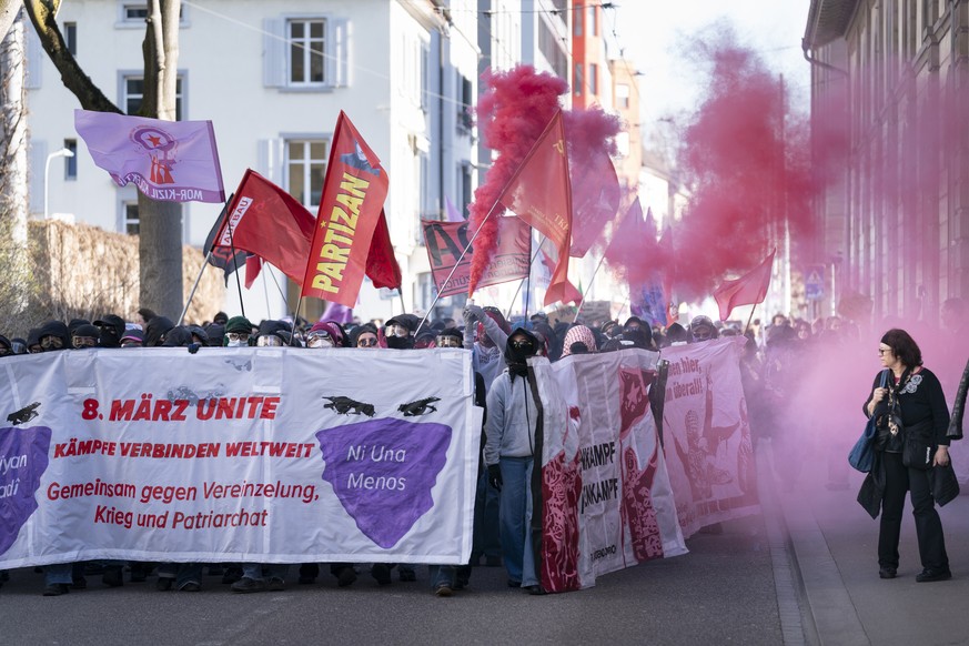 An estimated 5000 Women, lesbians, trans, inter- and non-binary people protest at the unauthorised colourful and combative women&#039;s demonstration in the streets of Zurich, on the occasion of Inter ...