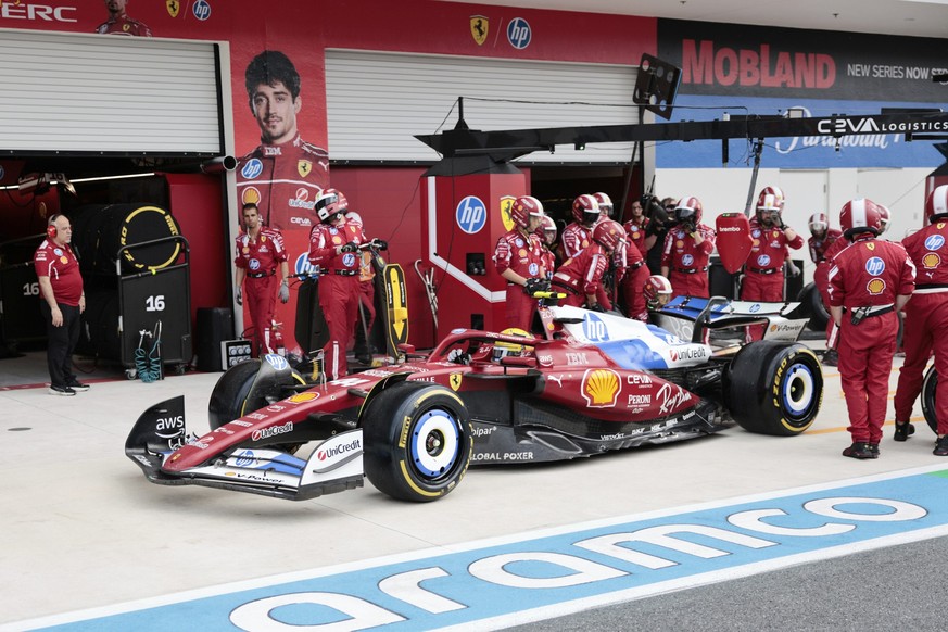 Ferrari driver Lewis Hamilton of Britain makes a pit stop during the Formula One Miami Grand Prix auto race Sunday, May 4, 2025, in Miami Gardens. Fla. (Shawn Thew/Pool Photo via AP)
